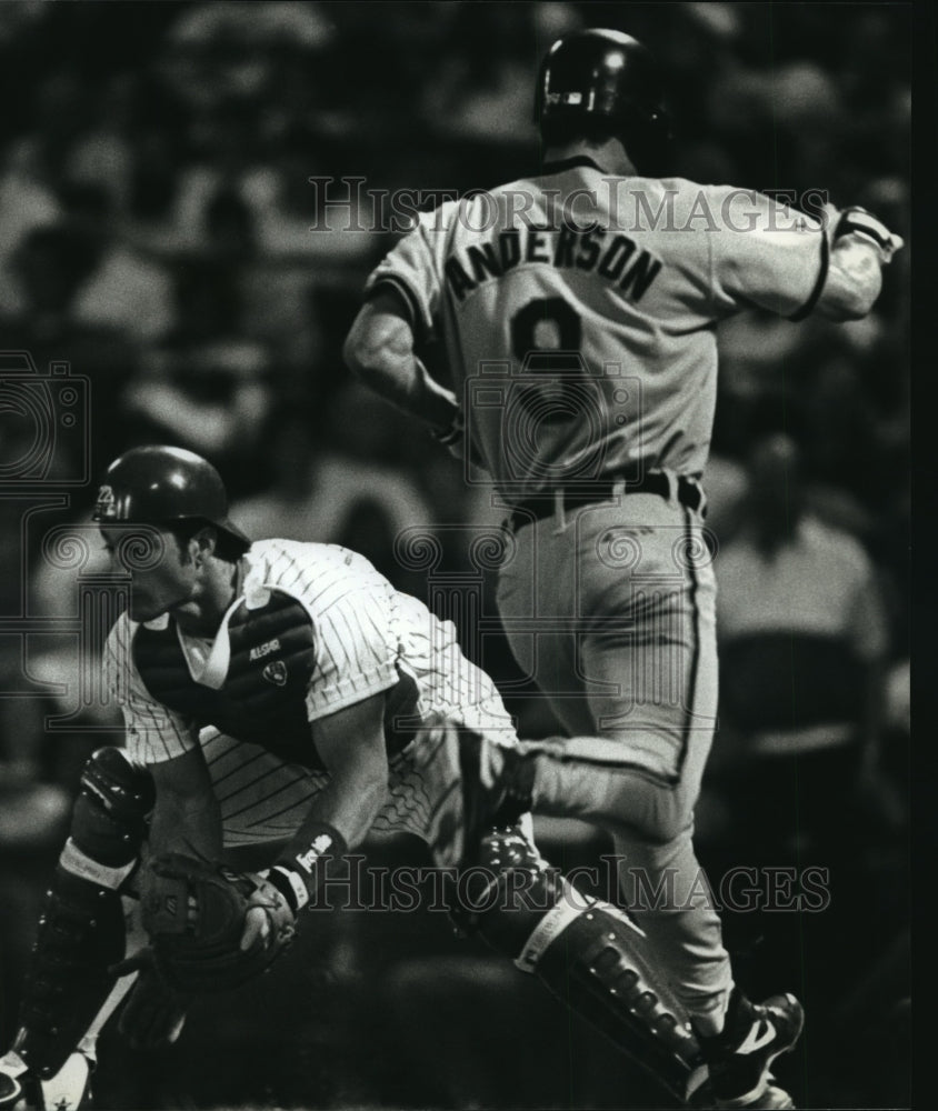 1993 Baseball's Brady Anderson runs past Brewers catcher Tom Lampkin - Historic Images