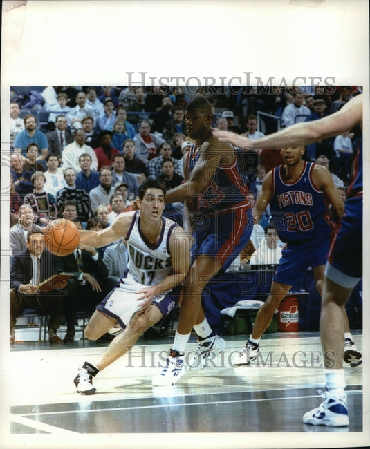 1994 Milwaukee basketball's Jon Barry leaves Detroit's Allan Houston - Historic Images