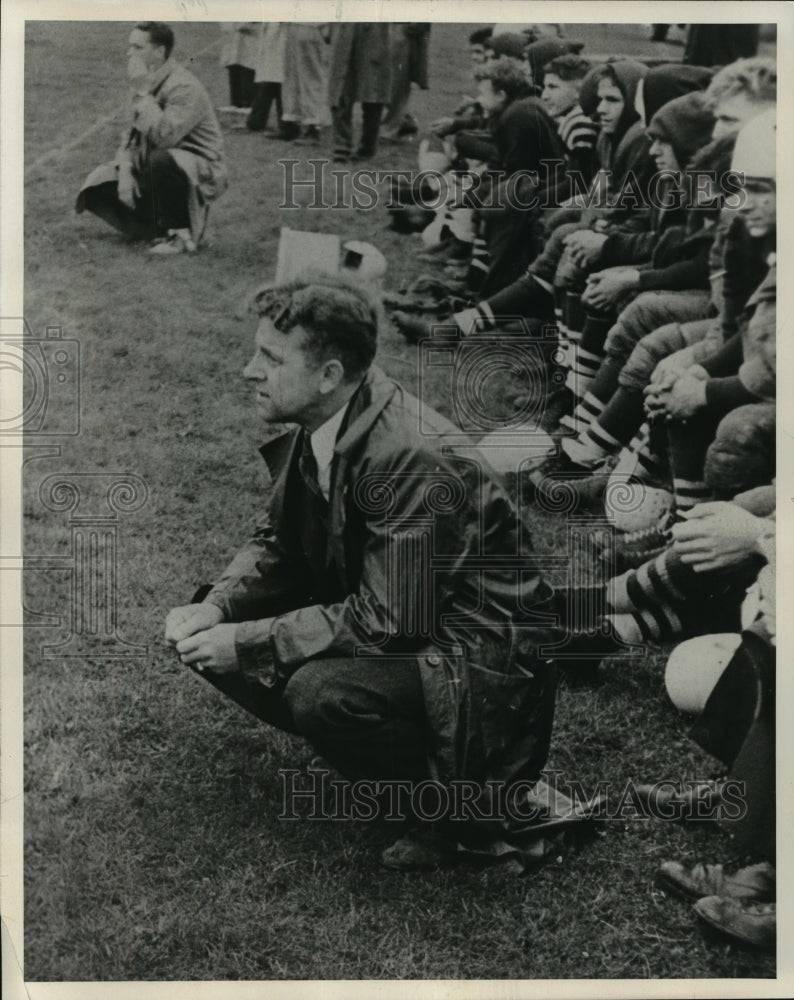 1969 Herman Kluge, UWM athletic director, watches from the sidelines - Historic Images