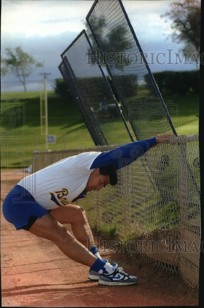 1993 Press Photo Brewers baseball player Teddy Higuera stretches before workout- Historic Images