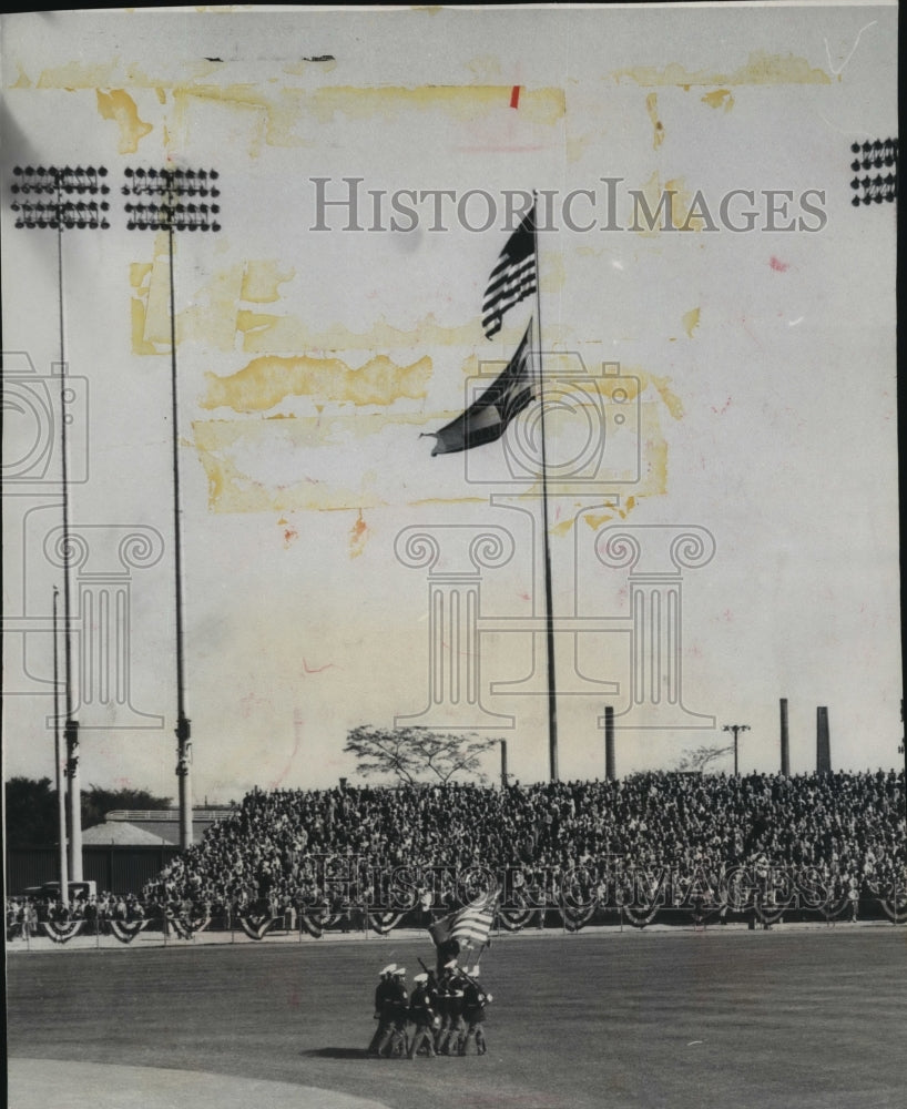 1958 Press Photo World's Champion banner paraded on the field as spectator watch- Historic Images