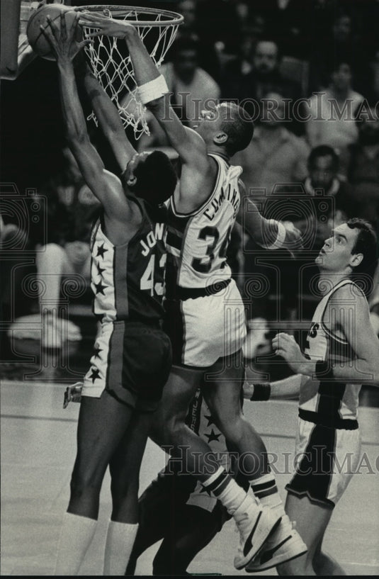 1986 Bucks basketball's Terry Cummings in action, blocks shot - Historic Images