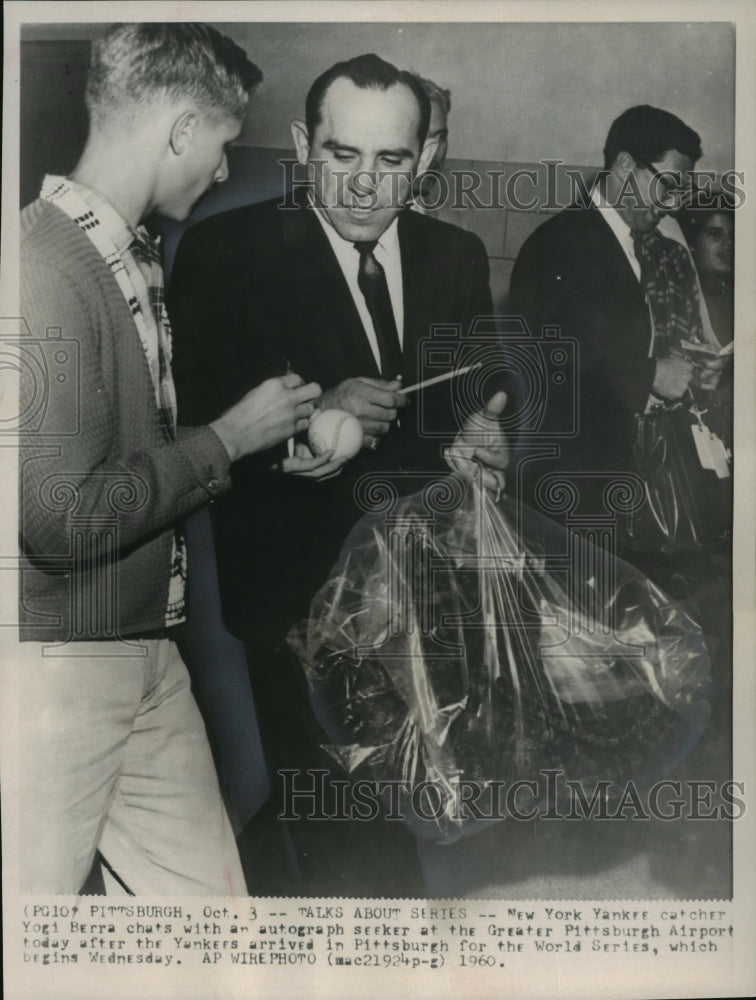 1960 Autograph seeker with Yogi Barra catcher for New York Yankees. - Historic Images