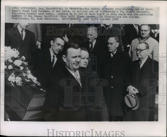 1965 Footballer Harry Stuhldreher's coffin carried from St. Paul's. - Historic Images