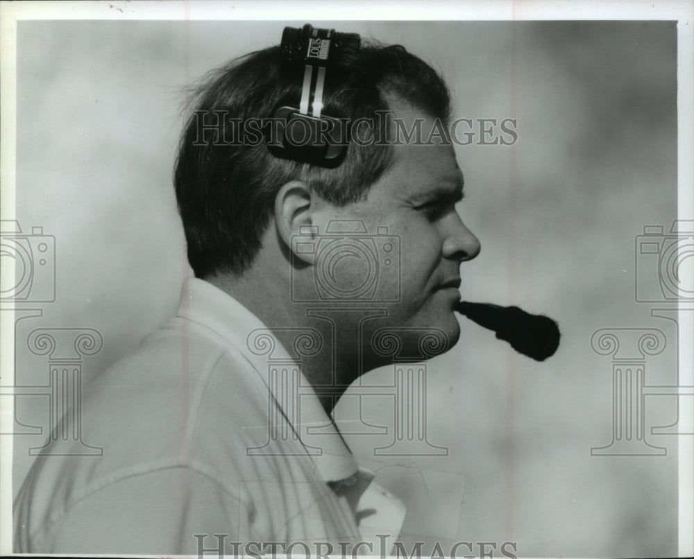 1994 Kevin Cosgrove football coach with head set on. - Historic Images
