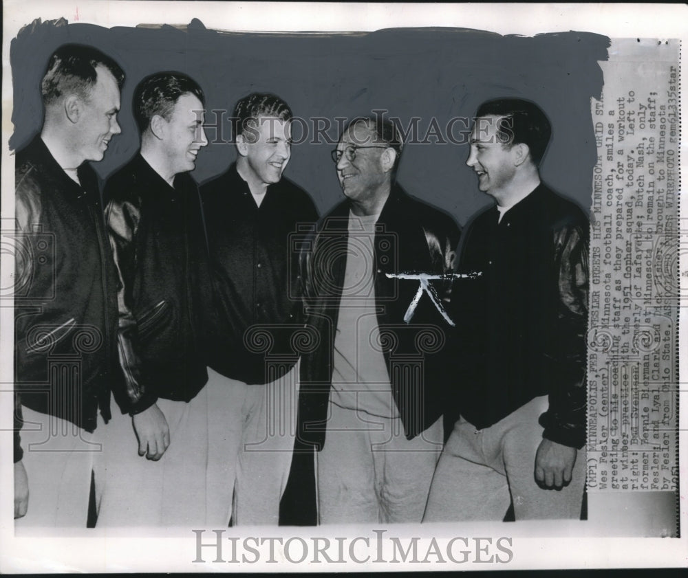 1951 New Minnesota football coach Wes Fesler meets his staff - Historic Images