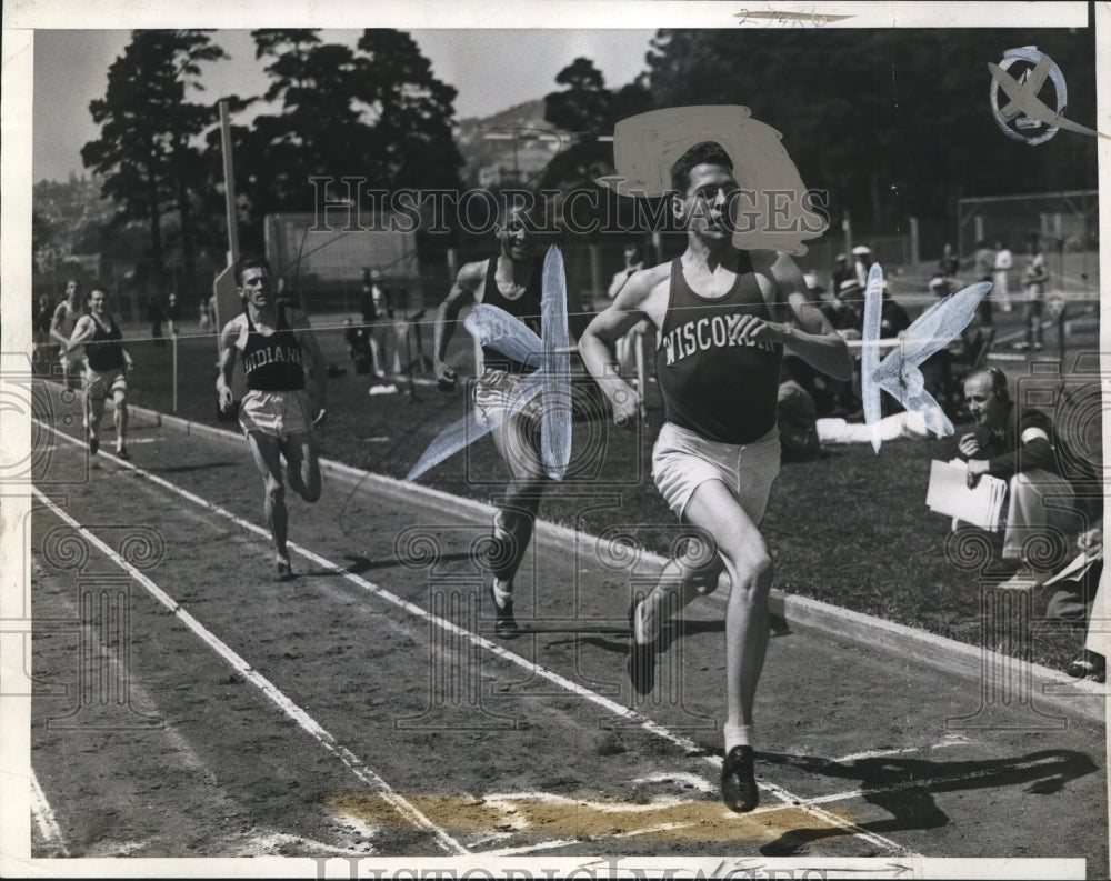1937 Wisconsin runner Charley Fenske in action - Historic Images
