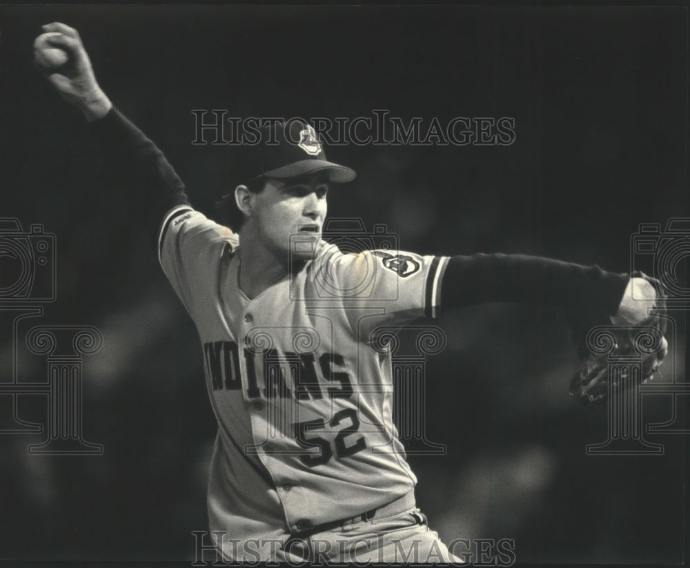 1987 Press Photo Cleveland pitcher John Farrell throwing to a Brewers player. - Historic Images