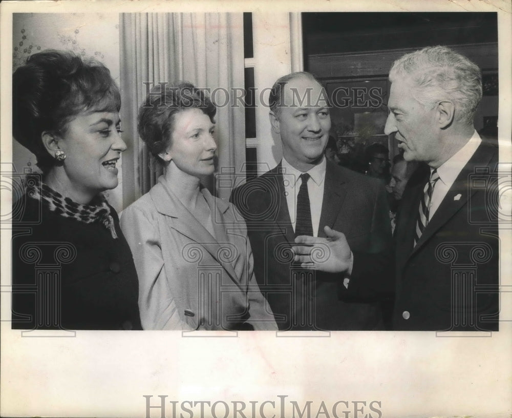 1966 Dr. &amp; Mrs. Eichman and Governor &amp; Mrs. Knowles talk football - Historic Images