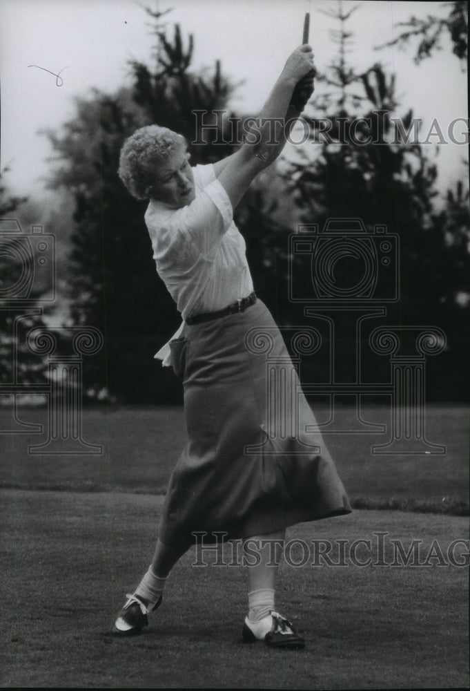 1966 Milwaukee's golf queen Paula Clauder completes perfect swing - Historic Images