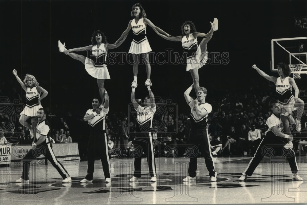 1987 Press Photo Marquette University Varsity Cheerleaders At Northwestern Game - Historic Images