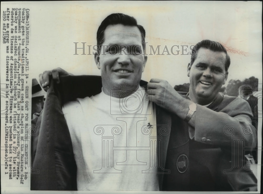 1968 Golfer Bob Goalby gets his Green Coat from Gay Brewer - Historic Images