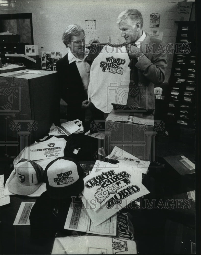 1982 Press Photo Fan Fare execs with Brewers baseball & World series merchandise- Historic Images