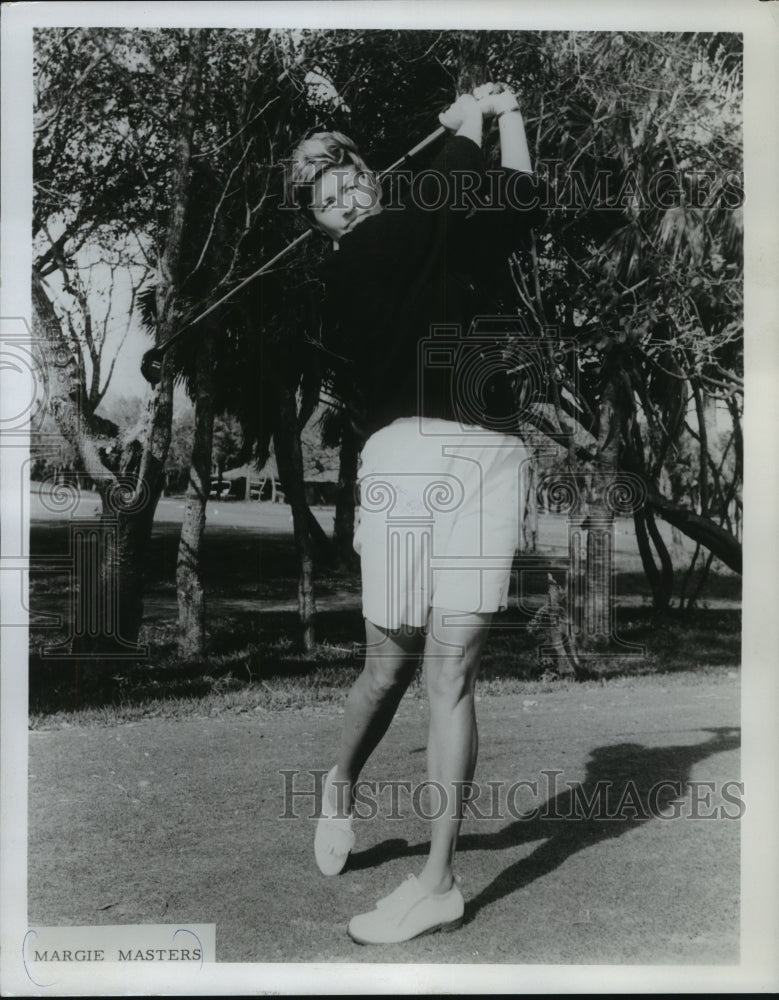 1967 Press Photo Margie Masters hits a golf ball. - mjt11292 - Historic Images