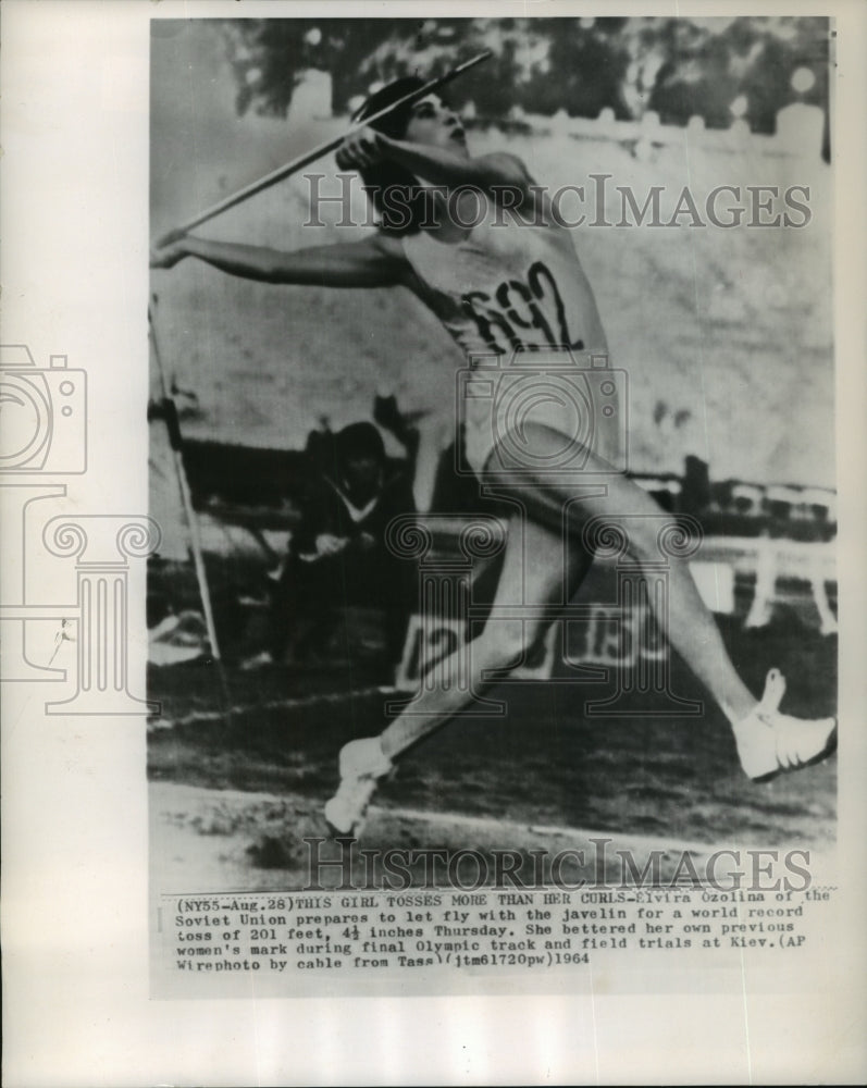 1964 Elvira Ozolina prepares starts javelin flight for world record - Historic Images