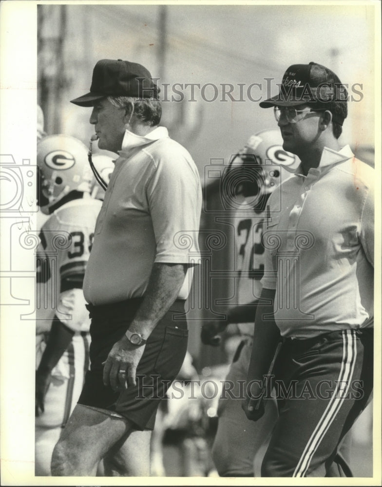 1986 Press Photo Packers football coach Forrest Gregg with his son, Forrest Jr.- Historic Images