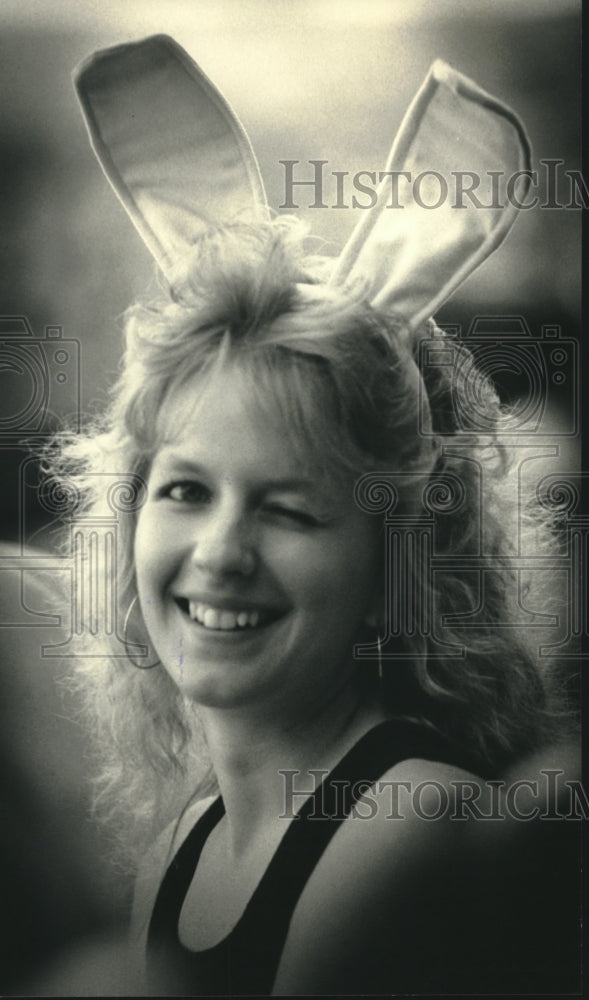 1987 Press Photo Brewer fan, Judy Prout, winks and shows off her Easter ears. - Historic Images