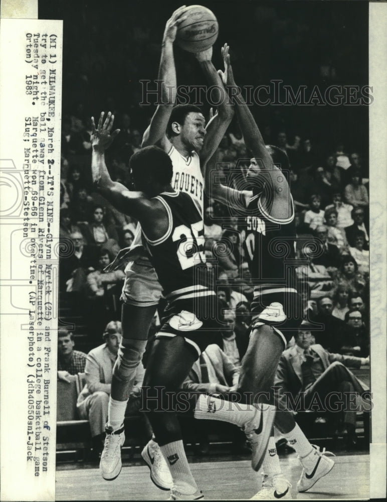 1983 Press Photo Marquette basketball&#39;s Glenn Rivers flanked by Stetson players - Historic Images