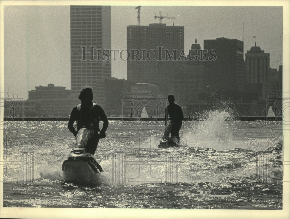 1984 Rob Kowaleski, Tim Mervau jet skis on Lake Michigan waters - Historic Images