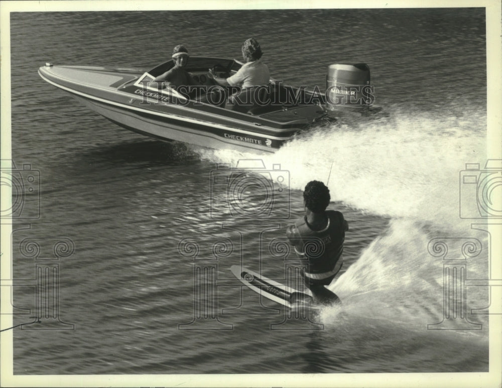 1984 A water skier rides the waves on one of Wisconsin&#39;s lake - Historic Images