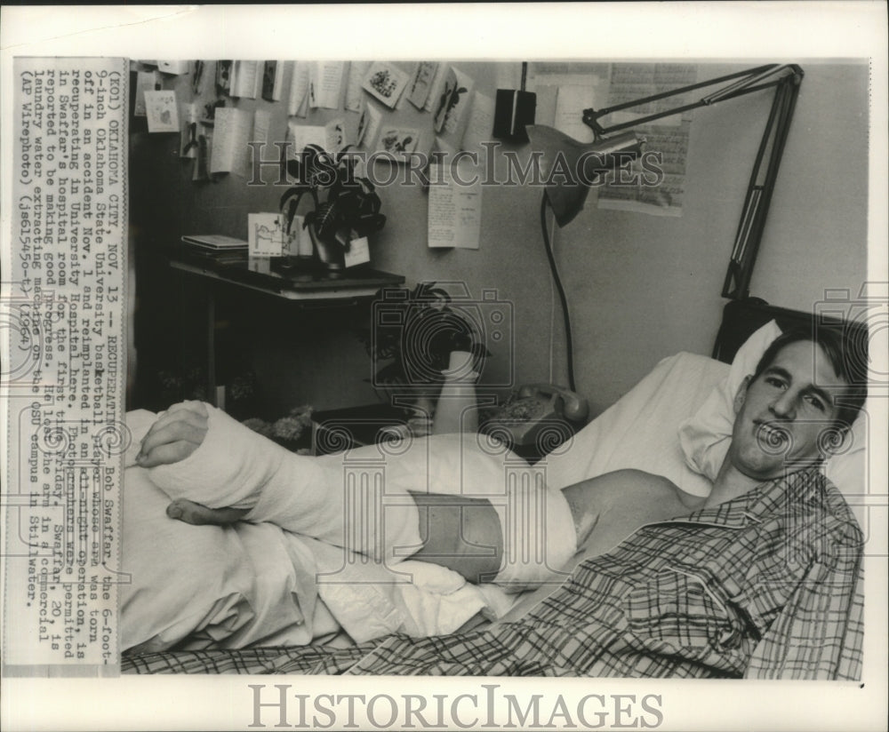 1964 OSU basketball player, Bob Swaffar, after  arm was reattached. - Historic Images