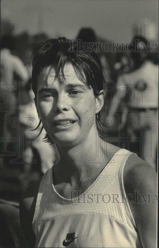 1985 Audrey O'Brien, marathon runner at race, in Wisconsin. - Historic Images