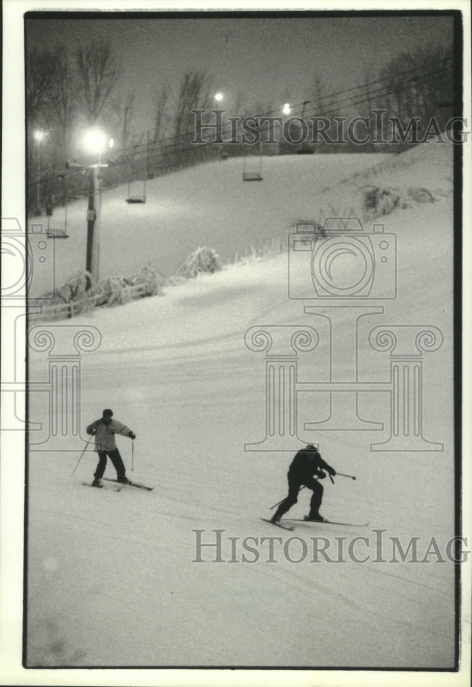 1994 A pair of skiers at the Sunburst Ski Hill in Kewaskum - Historic Images