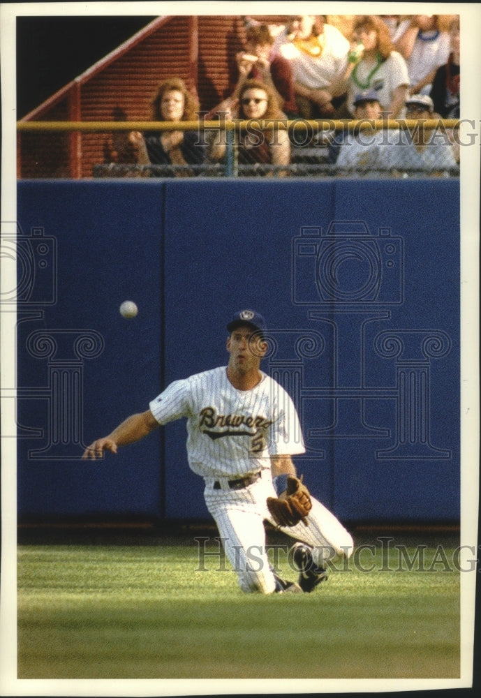 1993 Press Photo Brewers B.J. Surhoff goes down to the ground after a fly ball.- Historic Images