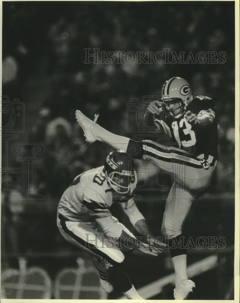 1986 Press Photo Green Bay Packers punter Bucky Scribner gets it away. - Historic Images