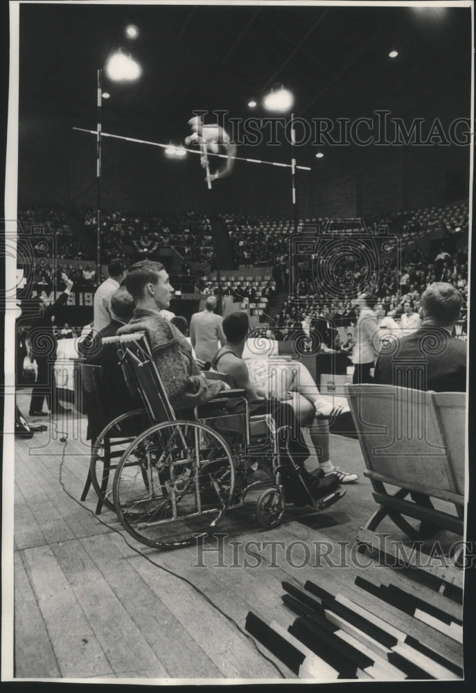 1964 PressPhoto Paralyzed pole vaulter Brian Sternberg watches The Journal Games - Historic Images