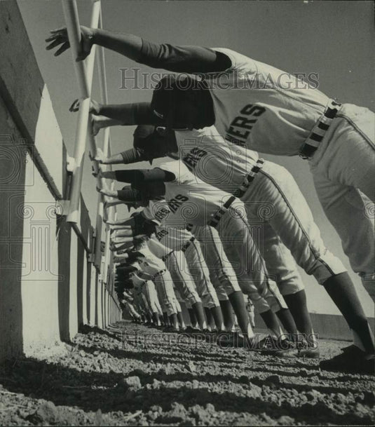  Milwaukee Brewer's Baseball Team stretch before playing - Historic Images