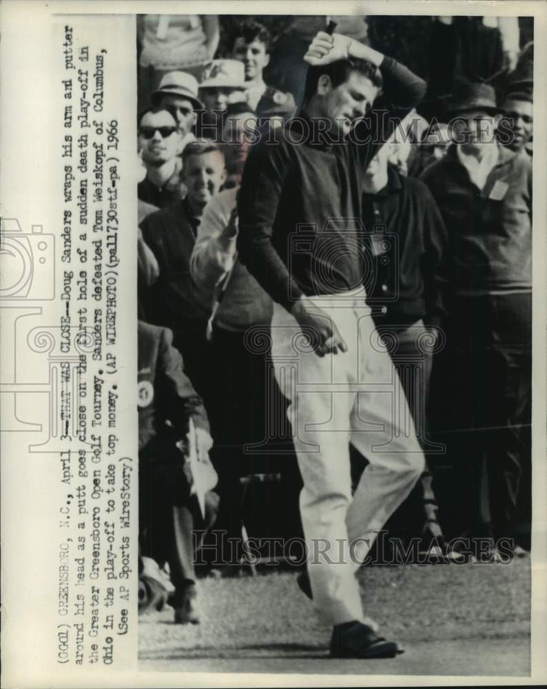 1966 Golfer Doug Sanders fails to drop a putt in a tournament - Historic Images