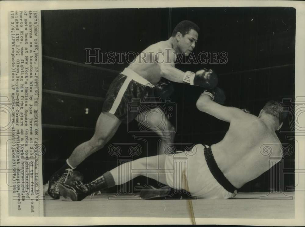 1964 Press Photo Boxer Jose Torres knocks Carl "Bobo" Olson out during bout- Historic Images