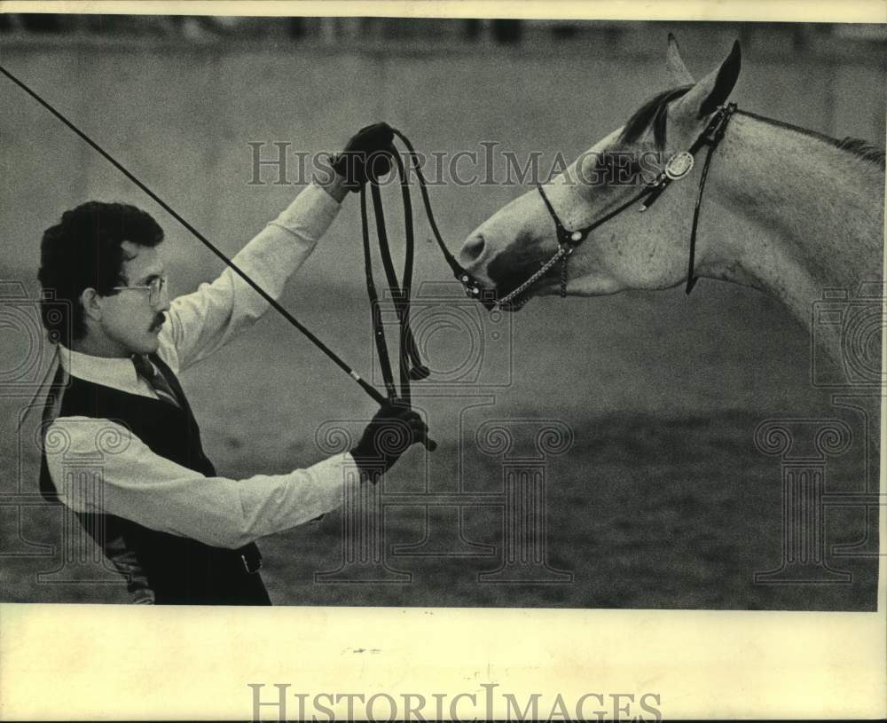 1985 Horse trainer Doug Menezes at the Wisconsin Arabian Horse show - Historic Images