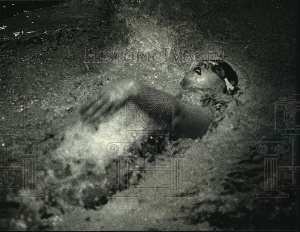 1990 Waukesha South&#39;s Daard Sizonore swims backstroke in relay event - Historic Images