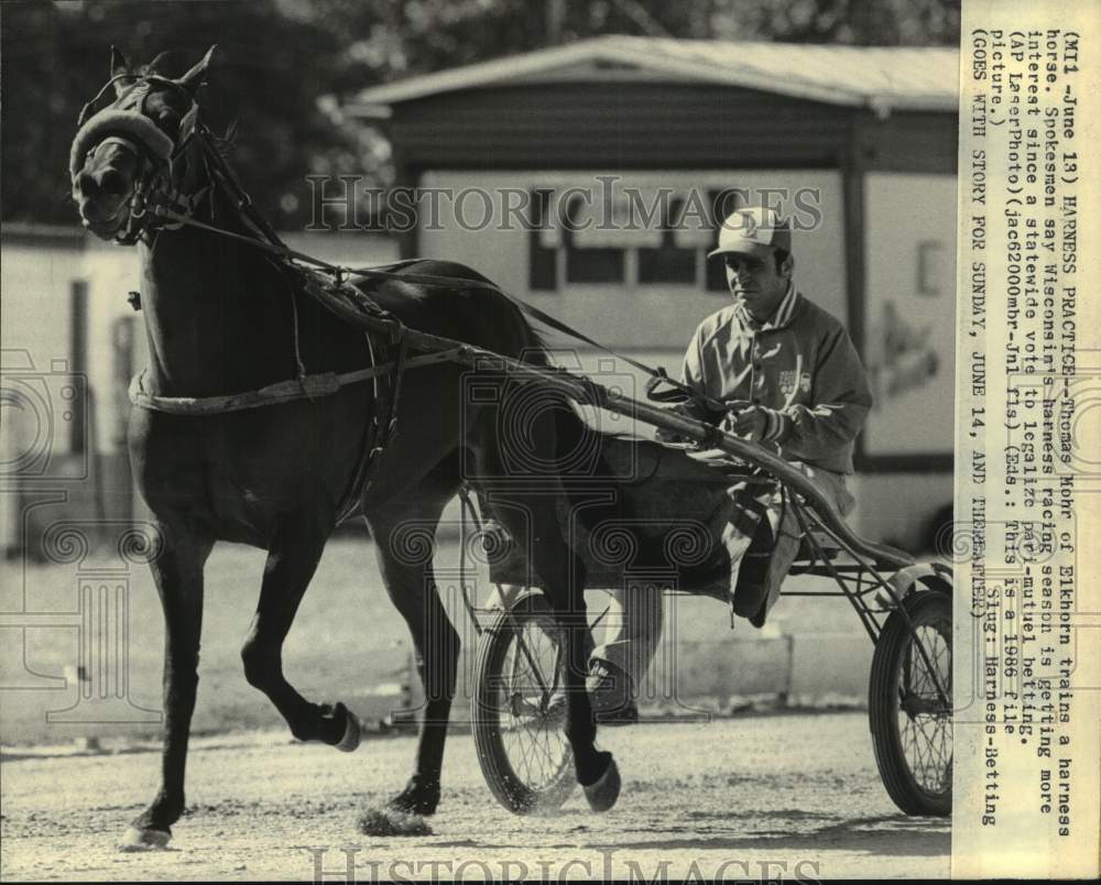 1986 Thomas Mohr of Elkhorn trains a harness horse - Historic Images