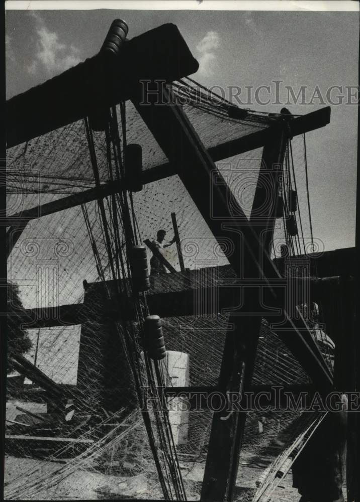 1961 Workers tear down fish shanty on Jones Island - Historic Images