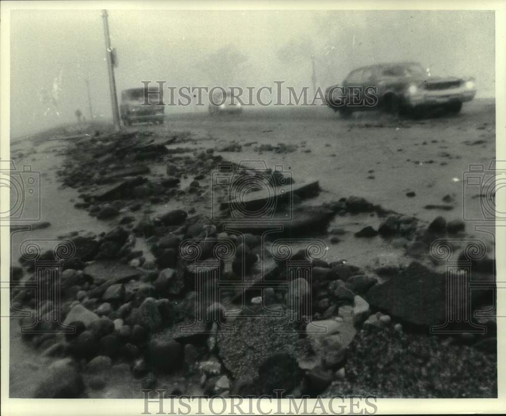 1973 Lake Michigan surf tossed rocks onto N. Lincoln Memorial Drive - Historic Images