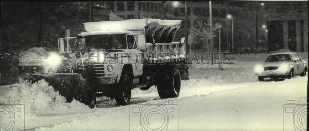 1962 Milwaukee Public Works plow clearing snow on North Water Street - Historic Images