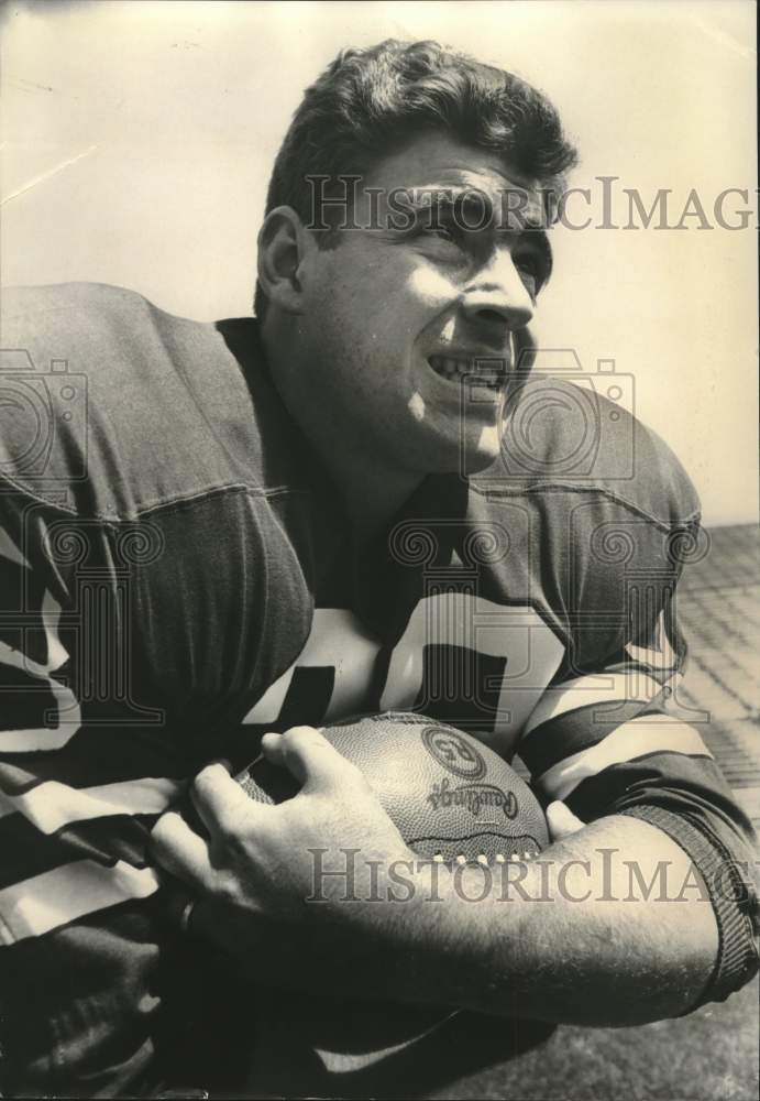 1968 Wayne Todd Holds Football - Historic Images