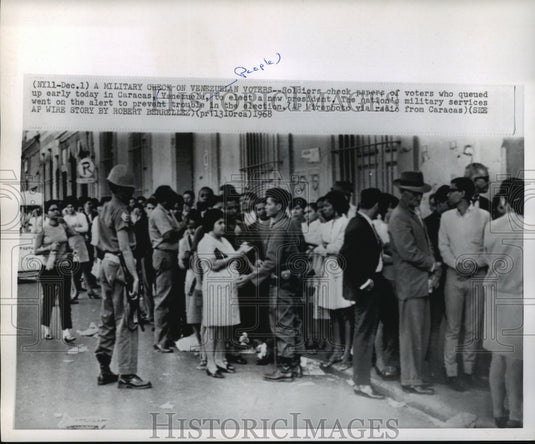 1968 Press Photo Soldiers in Caracas, Venezuela check voters' papers - mjw00274 - Historic Images