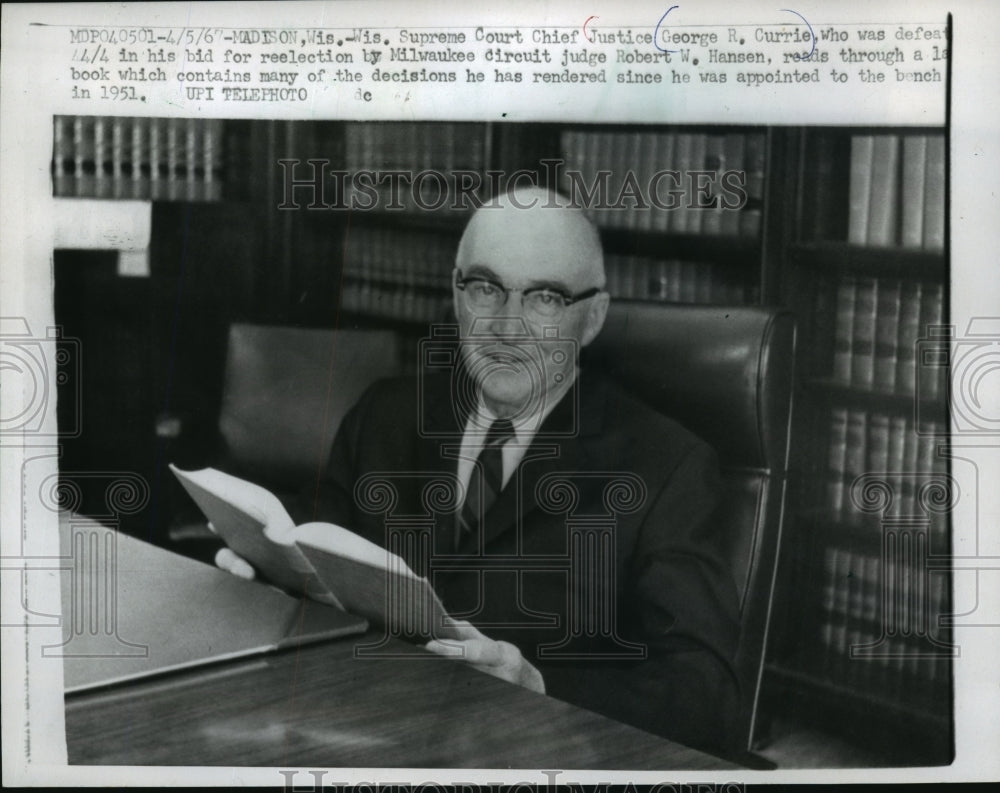 1967 Press Photo Chief Justice George R. Currie reads law book Madison,Wisconsin - Historic Images