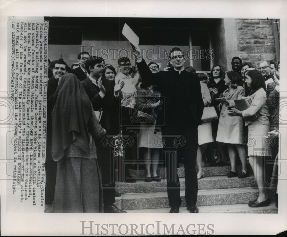 1967 Press Photo Rev. Charles Curran responds to students greetings, Washington-Historic Images