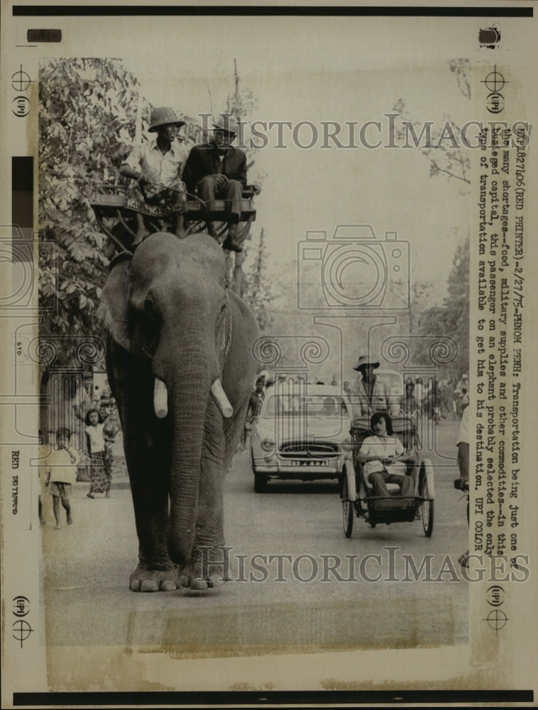 1975 Press Photo Elephants used as transportation in Phnom Penh, Cambodia - Historic Images