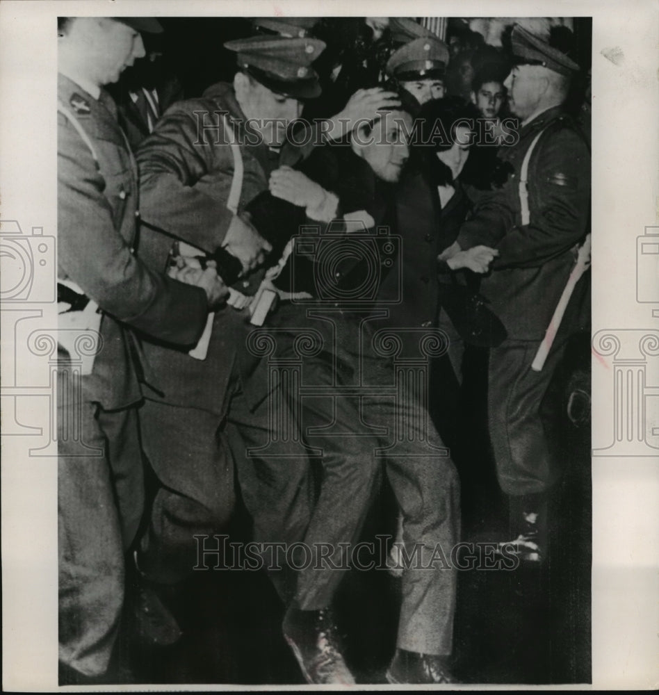 1965 Press Photo Police in Santiago, Chile hold two Marxist protestors - Historic Images