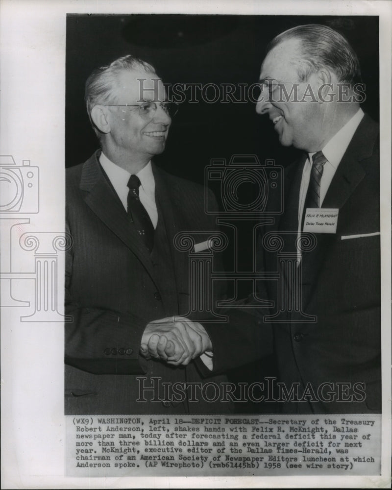 1958 Press Photo Robert Anderson shakes hands with Felix R. McKnight - mjw01099 - Historic Images