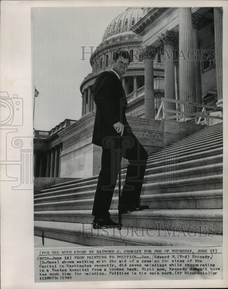 1965 Press Photo Sen. Edward M. Kennedy walks up Capitol steps with aid of cane. - Historic Images