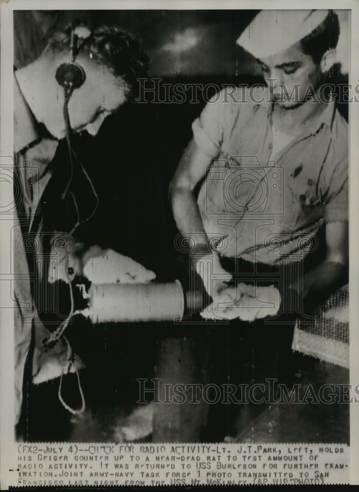 1946 Testing rat for radiation is Lieutenant J. T. Park and another.-Historic Images
