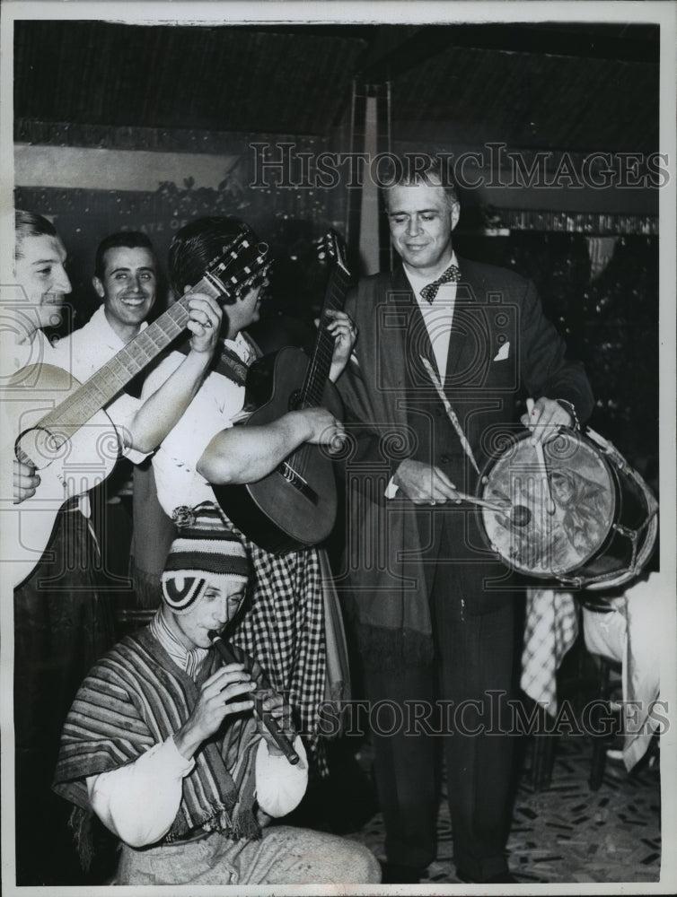 1960 Press Photo Michigan Gov. G. Mennen Williams plays drums in Argentina - Historic Images