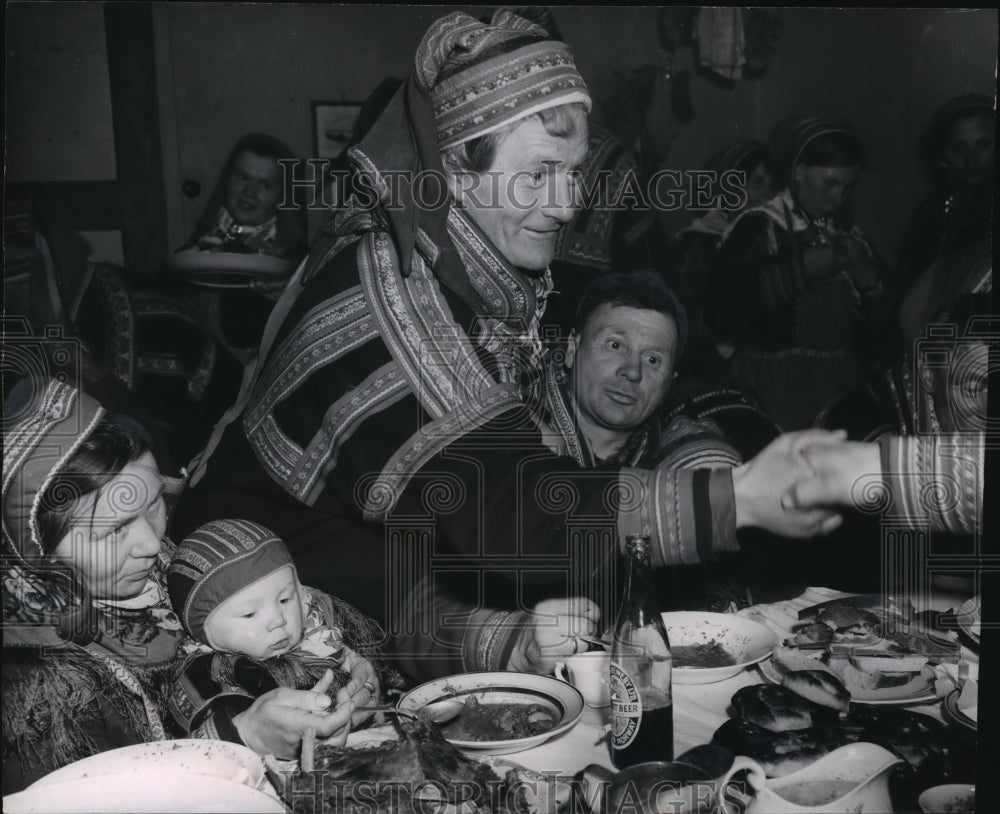 1952 Lapland people at a traditional wedding reception. - Historic Images